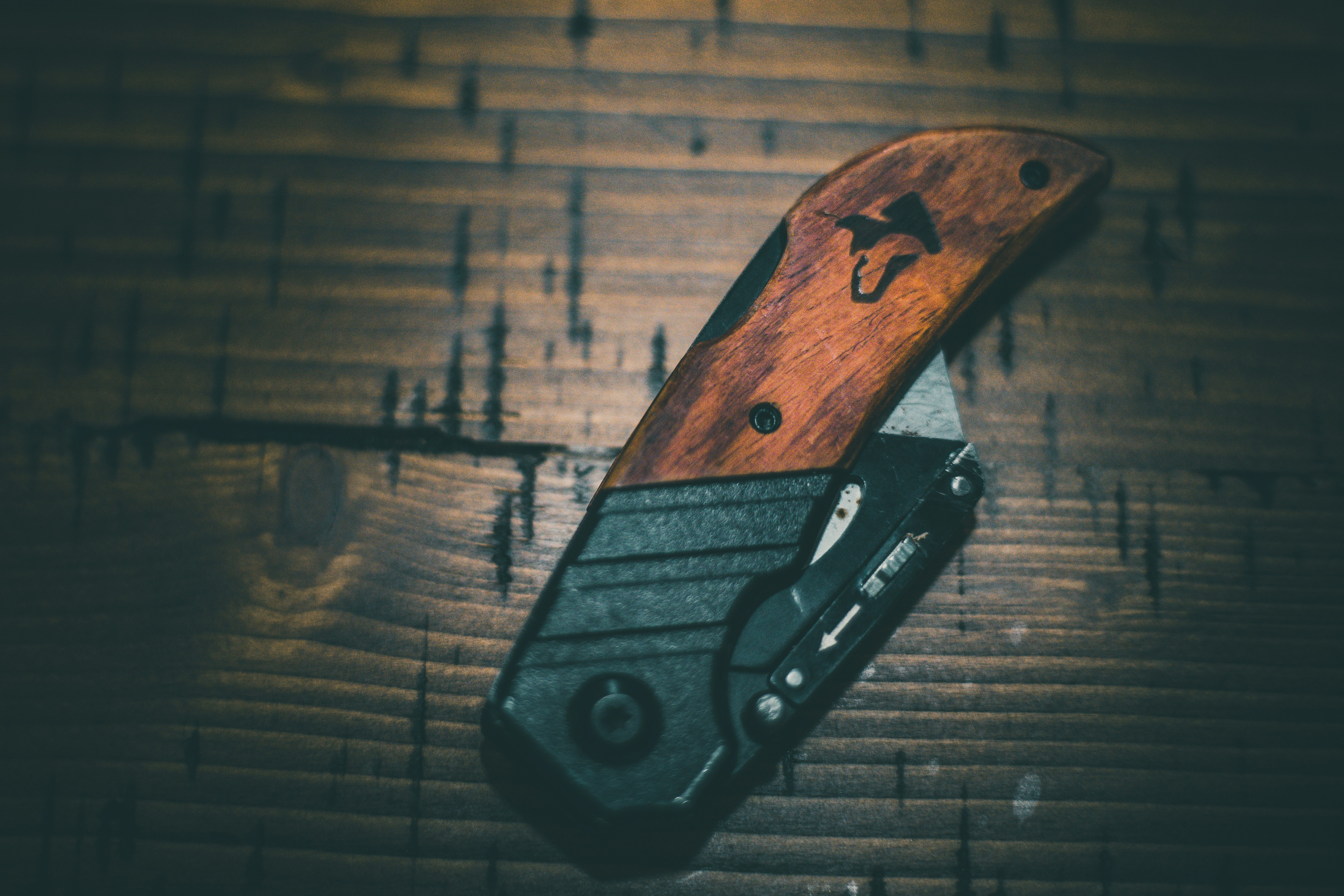 black and brown folding knife